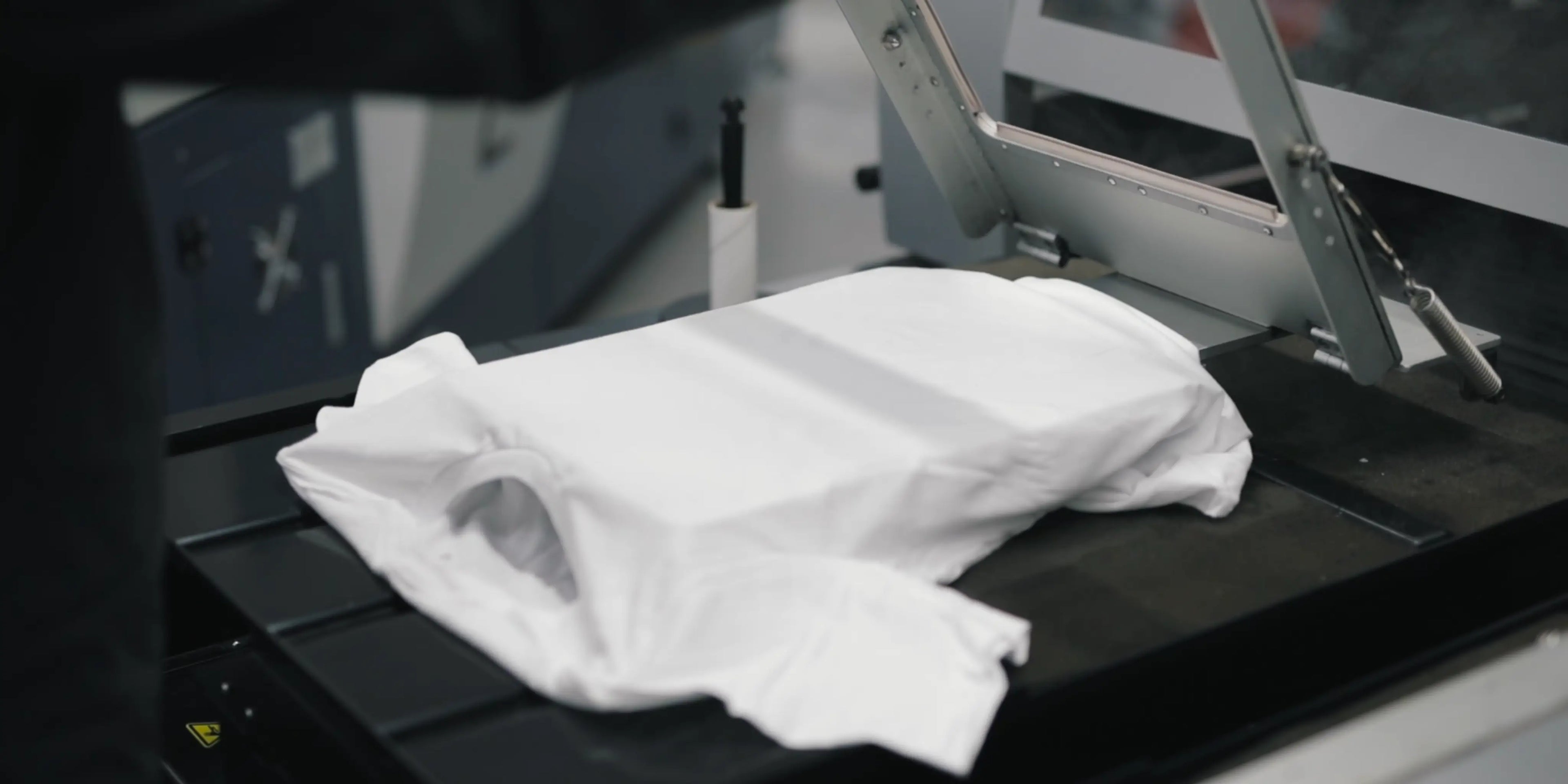 Load video: Our printing process - graphics on shirts